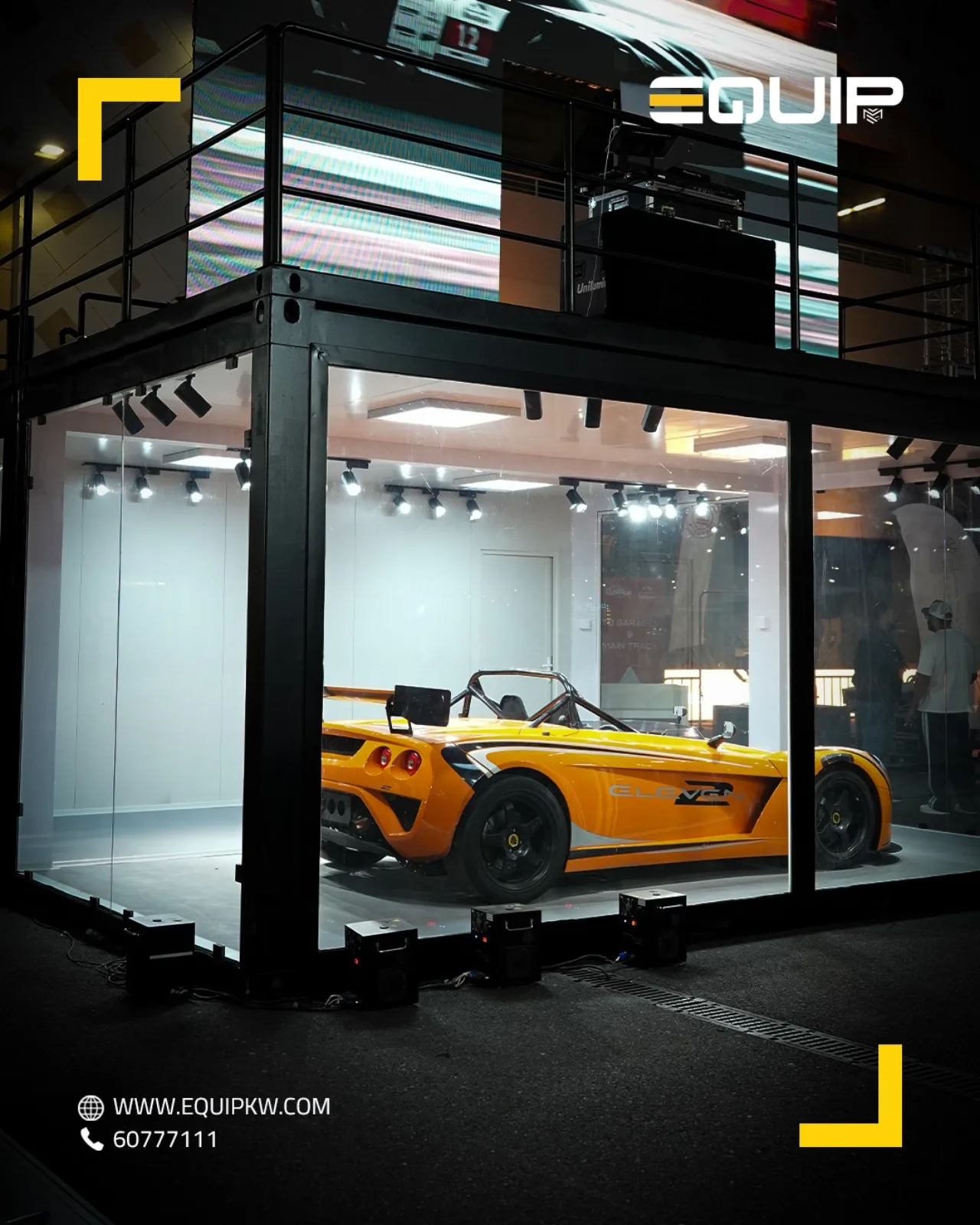 EQUIP two-storey container showroom at night